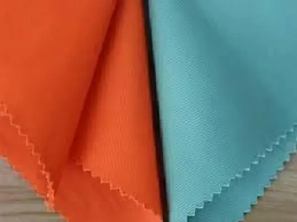 خرید عمده پارچه فلامنت سوزنی و فلامنت ورزشی